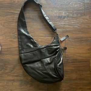 Genuine Leather DKNY crossbody bag.